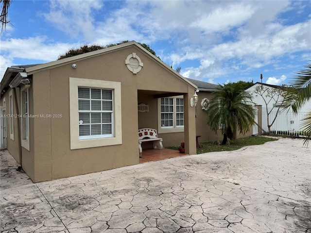 view of front of house with a patio