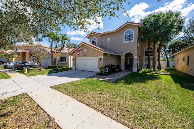 mediterranean / spanish-style home featuring a garage and a front lawn