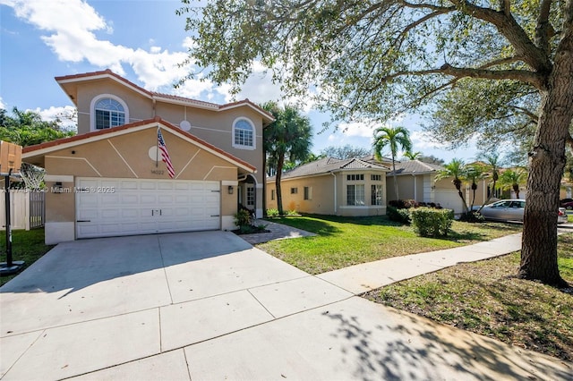 view of front of home featuring a garage and a front yard