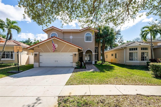 mediterranean / spanish-style house with a front yard