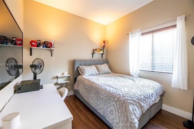 bedroom featuring dark hardwood / wood-style floors