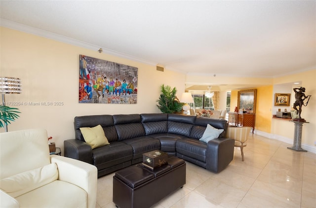 living room featuring crown molding