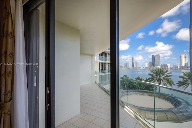 balcony featuring a water view