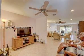 living room with ceiling fan