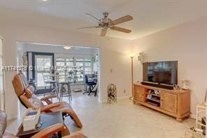 living room with ceiling fan