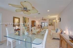 dining space with ceiling fan