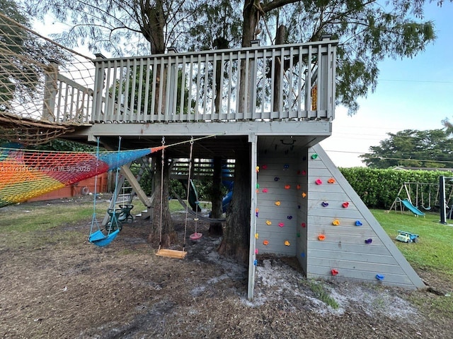 view of play area with a wooden deck