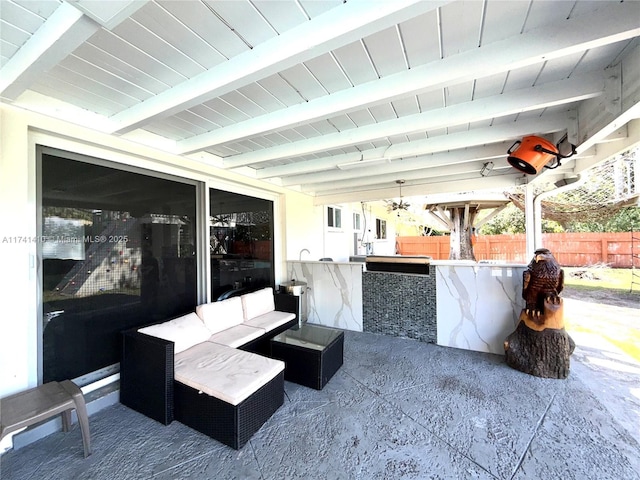 view of patio / terrace featuring an outdoor bar