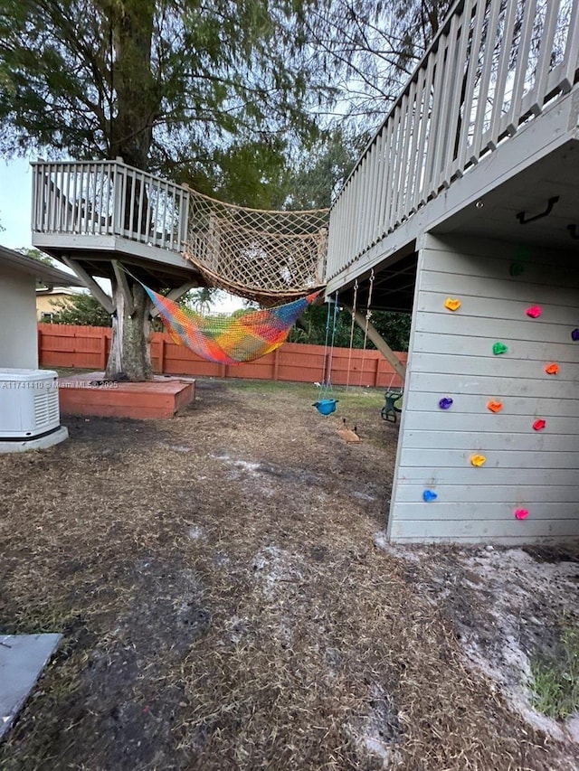 exterior space featuring a wooden deck