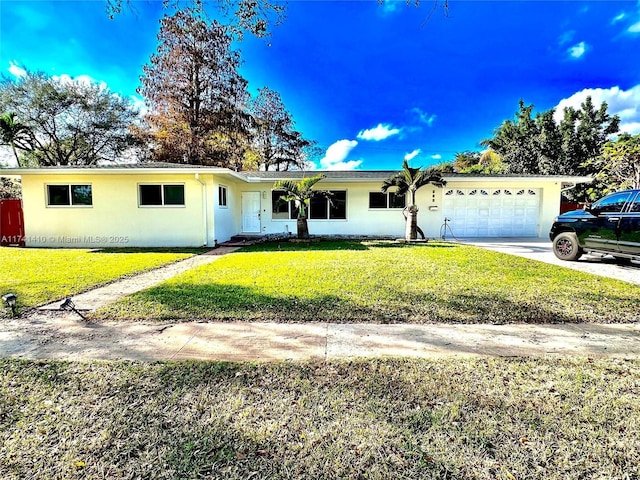 single story home featuring a garage and a front yard