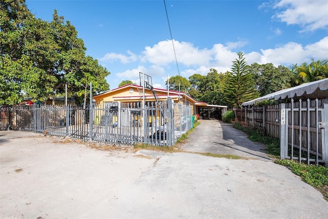 exterior space with a carport