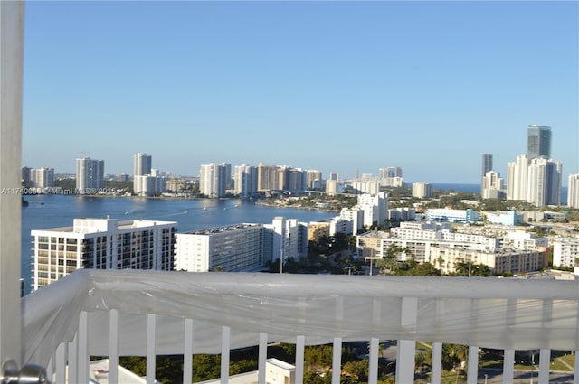 property's view of city featuring a water view