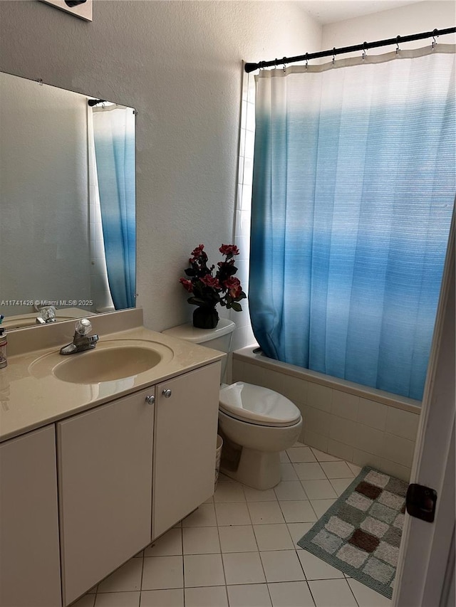 full bathroom with vanity, tile patterned flooring, shower / bath combo, and toilet