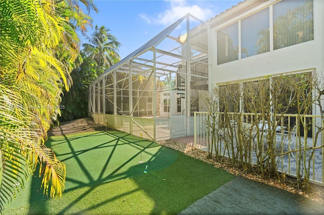 view of yard featuring a lanai