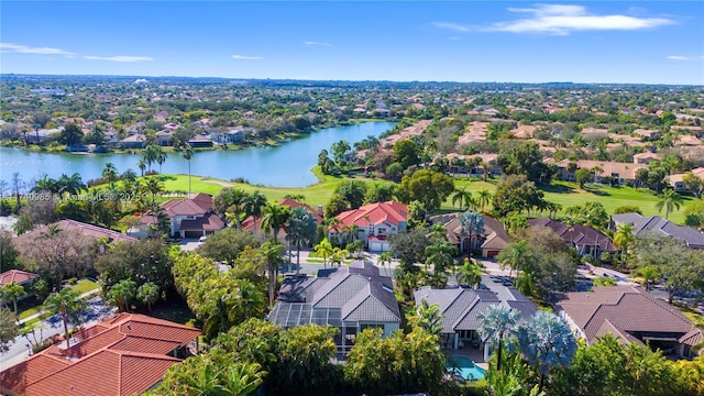 drone / aerial view with a water view