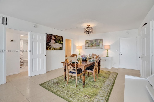 view of tiled dining space