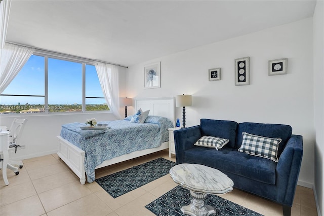 bedroom featuring light tile patterned floors