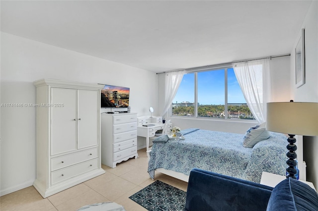 bedroom with light tile patterned flooring