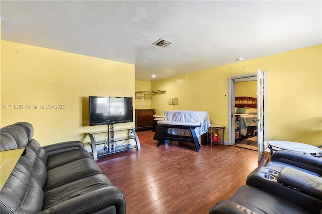 living room with dark wood-type flooring