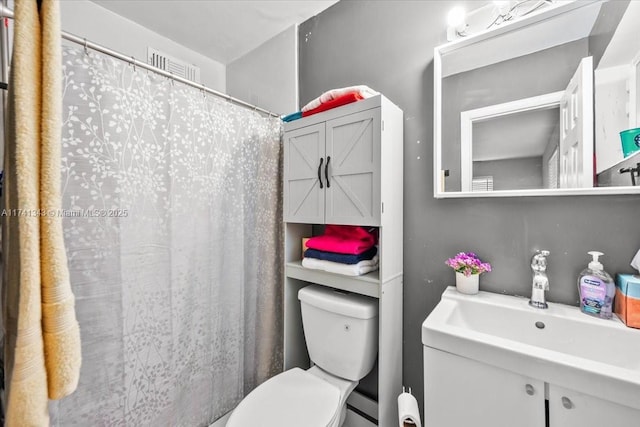 bathroom featuring sink and toilet