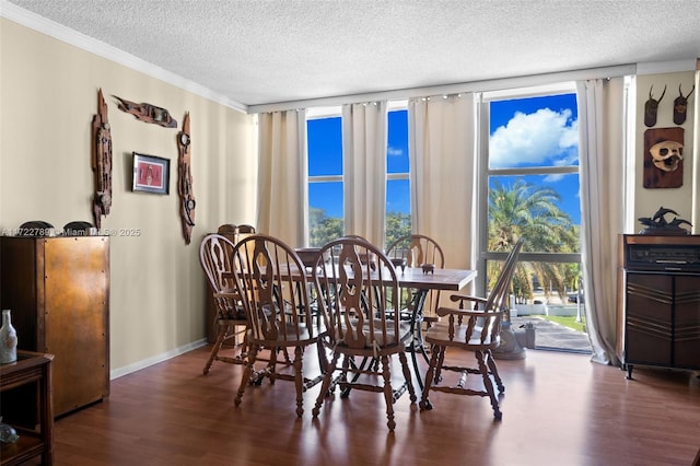 800 Parkview Dr Unit 523, Hallandale Beach, FL 33009 - dining area featuring crown molding, dark hardwood / wood-style floors, floor to ceiling windows, and a textured ceiling