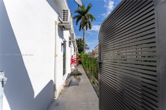 view of side of home with a patio