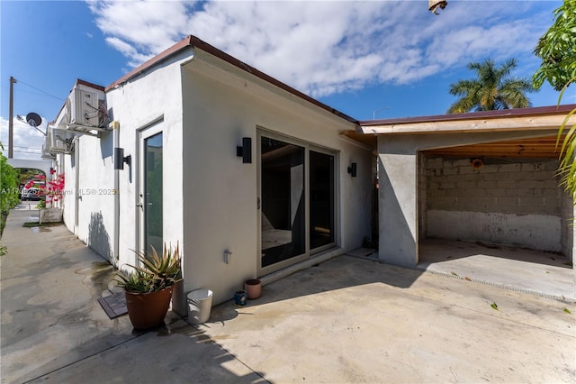 rear view of house featuring a patio