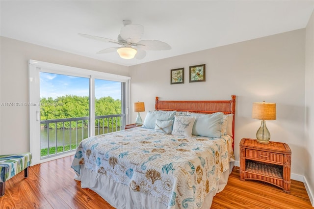 bedroom with ceiling fan, access to outside, and light wood-type flooring