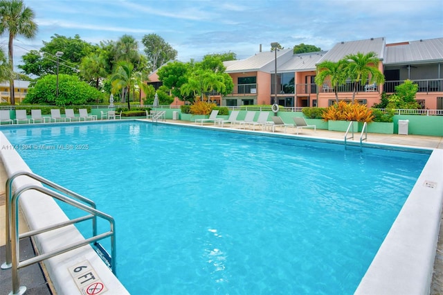 view of swimming pool featuring a patio