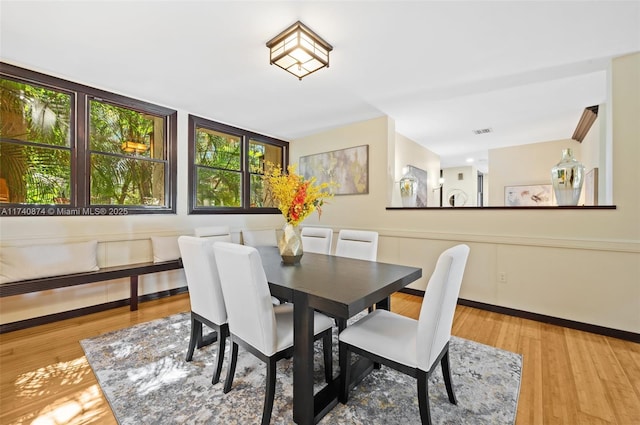 dining space featuring hardwood / wood-style flooring