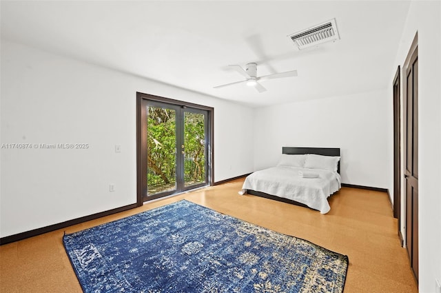 bedroom featuring access to exterior and ceiling fan