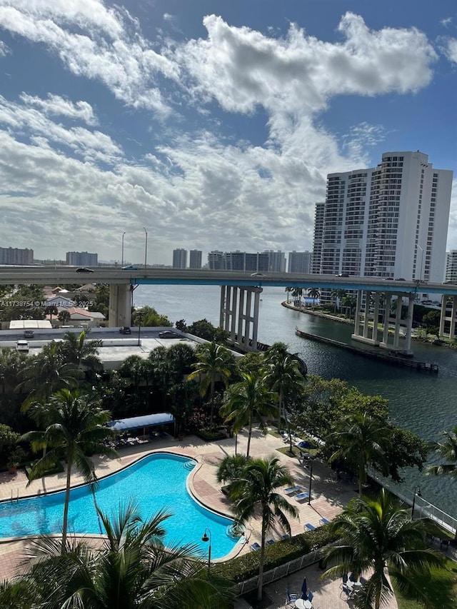 view of pool featuring a water view