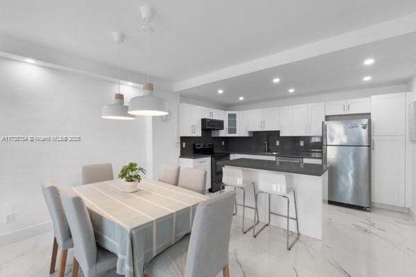 dining area with sink