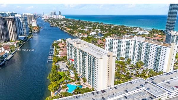 drone / aerial view with a water view