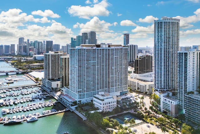 property's view of city featuring a water view