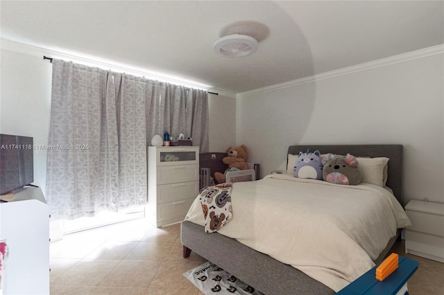 bedroom featuring crown molding and light tile patterned floors