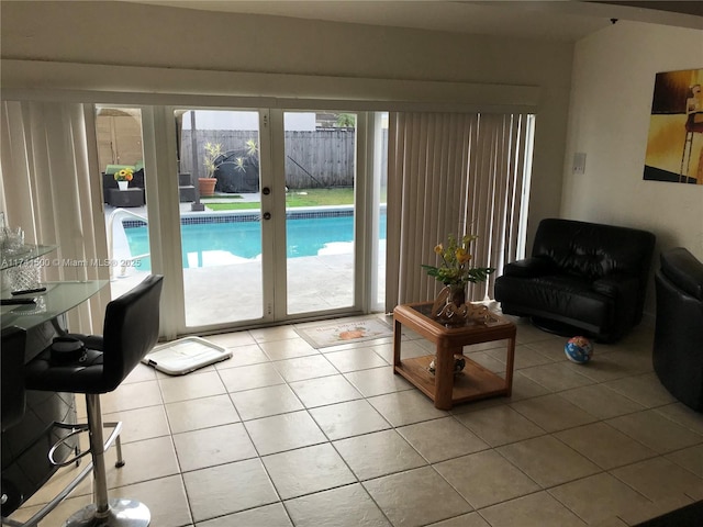 living room with light tile patterned floors