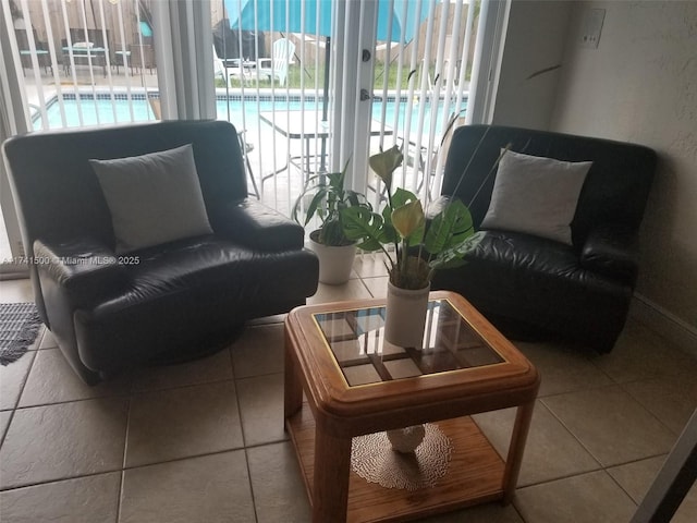 sitting room with tile patterned floors