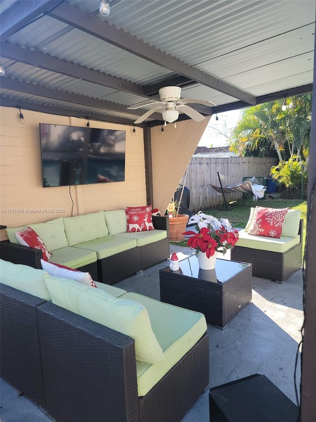 view of patio / terrace featuring an outdoor living space and ceiling fan