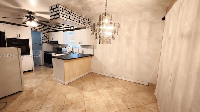 kitchen with stainless steel range with electric cooktop, oven, white cabinets, hanging light fixtures, and white refrigerator