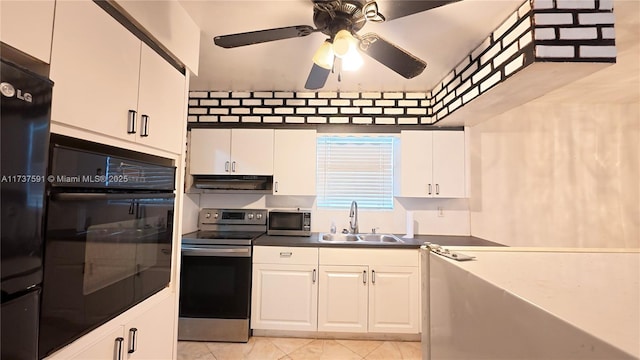 kitchen featuring white cabinetry, sink, and black appliances