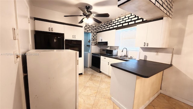 kitchen featuring sink, appliances with stainless steel finishes, kitchen peninsula, ceiling fan, and white cabinets