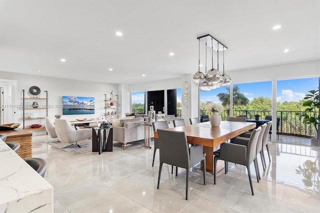dining space with an inviting chandelier