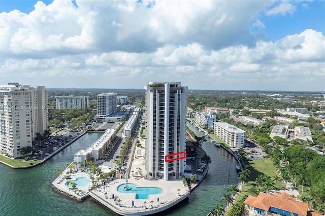 birds eye view of property featuring a water view