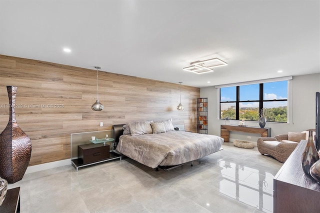 bedroom with wood walls