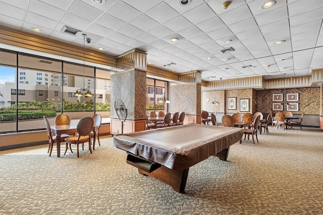 rec room with pool table, plenty of natural light, carpet flooring, and a paneled ceiling