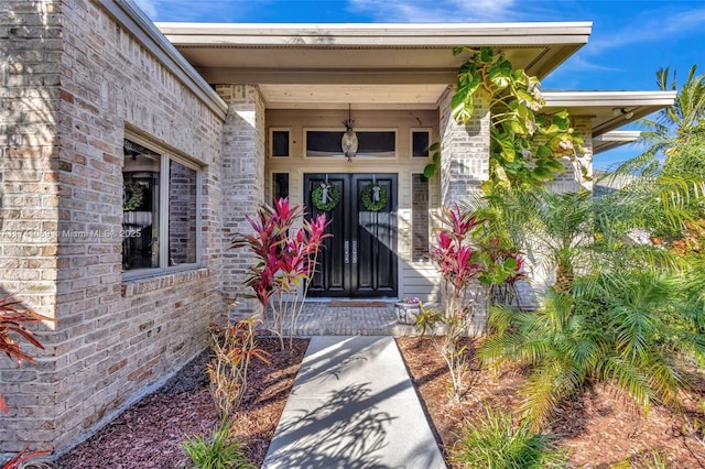 property entrance featuring french doors