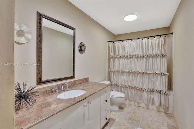 full bathroom featuring toilet, vanity, shower / tub combo, and tile patterned floors