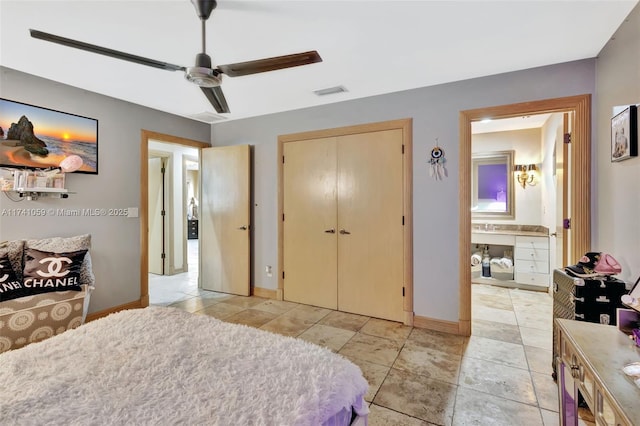 bedroom with ceiling fan, a closet, and ensuite bathroom