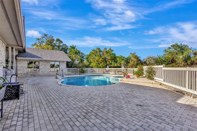 view of pool with a patio